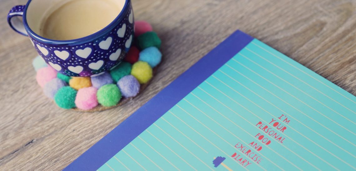 blue ceramic cup on tabletop